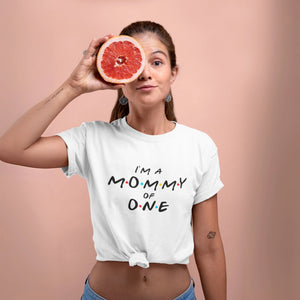 White T-shirt with a “I’M A MOMMY OF ONE” design on the front.